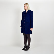 Load image into Gallery viewer, Model wearing Femponiq Velvet Tailored Blazer Dress in Royal Blue, showcasing a side view with a fitted silhouette and elegant design.