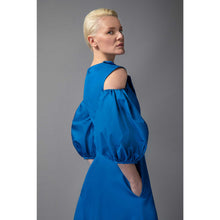 Load image into Gallery viewer, Model Is Wearing Asymmetric  A-Line Cotton Dress in Blue - Close-up Side Back and Sleeve View
