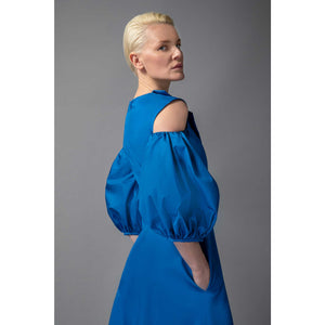 Model Is Wearing Asymmetric  A-Line Cotton Dress in Blue - Close-up Side Back and Sleeve View