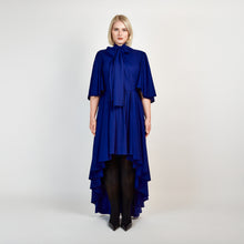 Load image into Gallery viewer, Front view of the Femponiq Bow Tie Neck Cape Sleeve Maxi Dress in Royal Blue, showcasing its elegant bow tie neckline, flowing cape sleeves, and floor-length silhouette.
