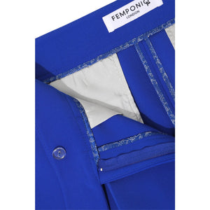 Close-up of waistband stitching and construction on royal blue tailored trousers