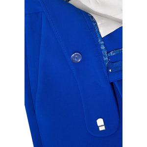 Close-up of waistband and front seam detailing on royal blue tailored trousers