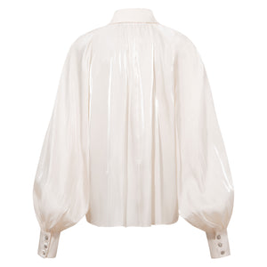 Back view of the Femponiq Gathered Neck Voluminous Raglan Sleeve Shirt in Pearl White, showcasing its elegant design and flowing silhouette.