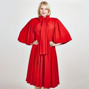 Close-up view of Femponiq's  Bow Tie Neck Ruched Midi Dress in scarlet red, featuring a chic bow tie neckline, elegant ruched detailing, and a flattering midi length, perfect for making a bold fashion statement.