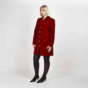 Model wearing Femponiq Velvet Tailored Blazer Dress in Red, showcasing a side view with a fitted silhouette and elegant design.