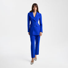 Load image into Gallery viewer, Front view of the Femponiq Asymmetric Pleated Blazer in Blue, featuring a tailored fit, asymmetric design, and bold, elegant silhouette.

