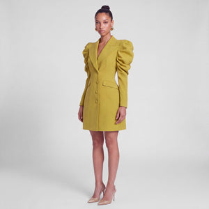 Femponiq mustard yellow tailored blazer dress with sculpted puff shoulders and fitted waist, front side view