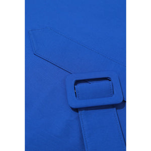Close-up of belt buckle detail on a royal blue asymmetric wide-lapel dress