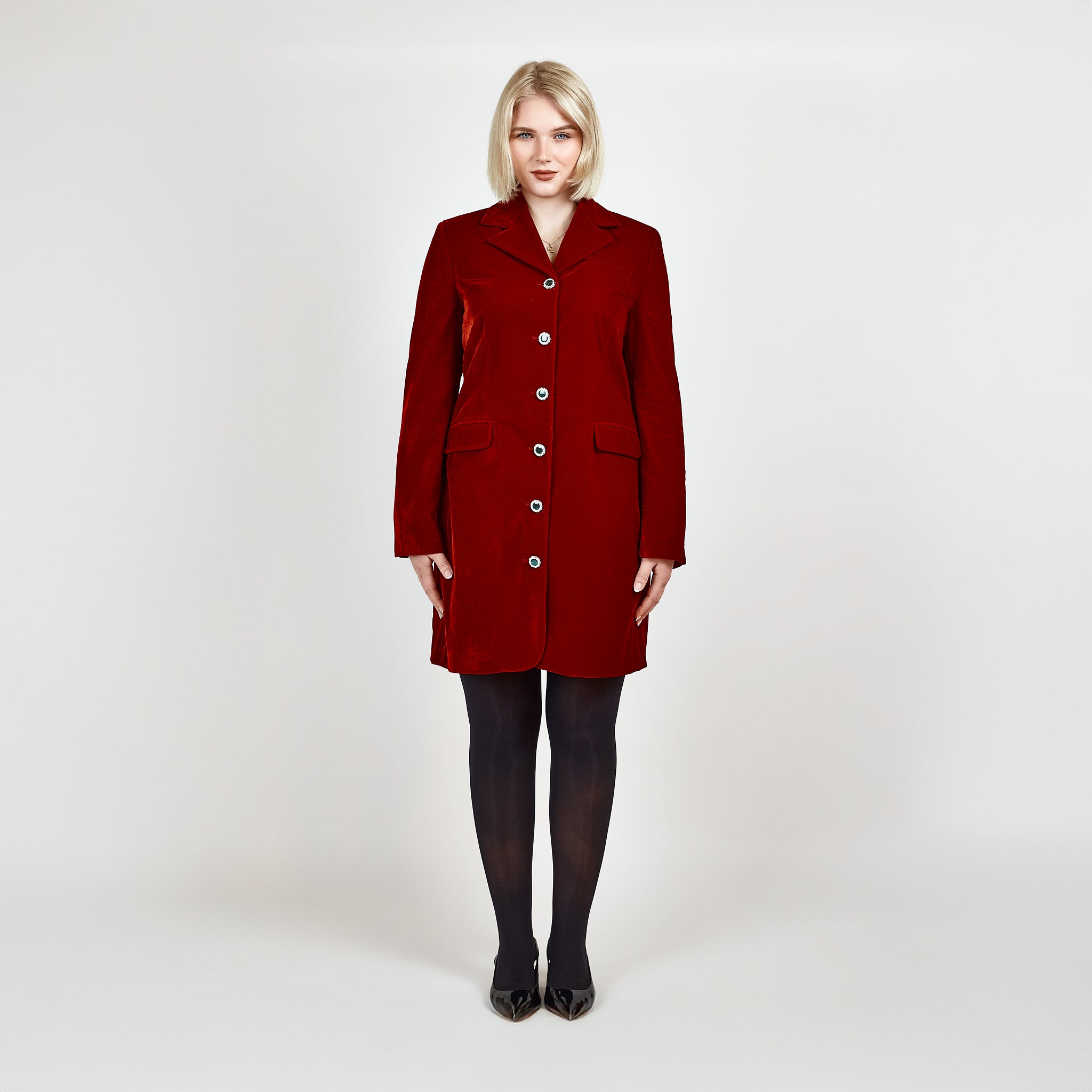 Video of a model showcasing the Femponiq Velvet Tailored Blazer in Red, highlighting its luxurious velvet fabric, sparkly buttons, sharp tailoring, and sophisticated design.