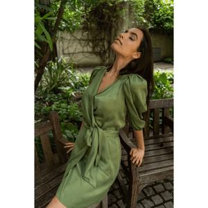 Model is wearing Femponiq  Green Wrap Dress