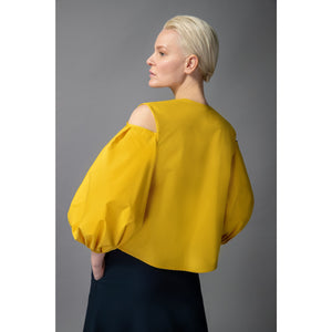 Model is Wearing Cold Shoulder Puff Sleeve Lapel Top in Golden Yellow - Close Up Back View