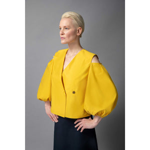 Model is Wearing Cold Shoulder Puff Sleeve Lapel Top in Golden Yellow - Close Up Front Detail